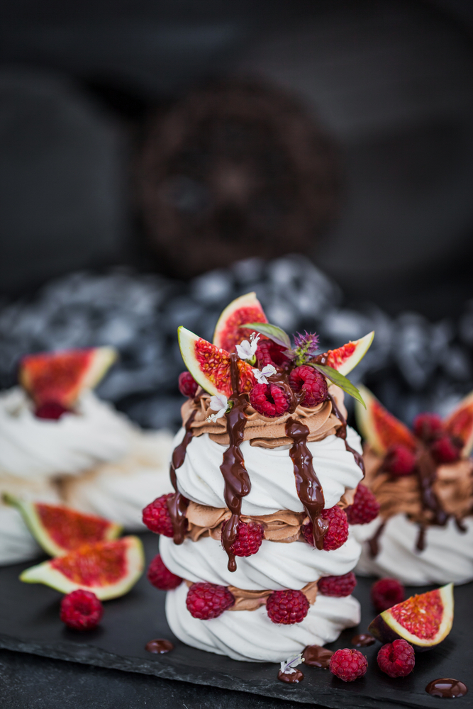pavlova with chocolate, figs, and fruit